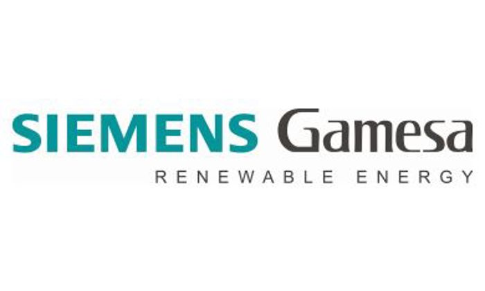 Logotipo de Siemens Gamesa Renewable Energy con el nombre de la empresa en verde azulado y texto negro sobre fondo blanco.
